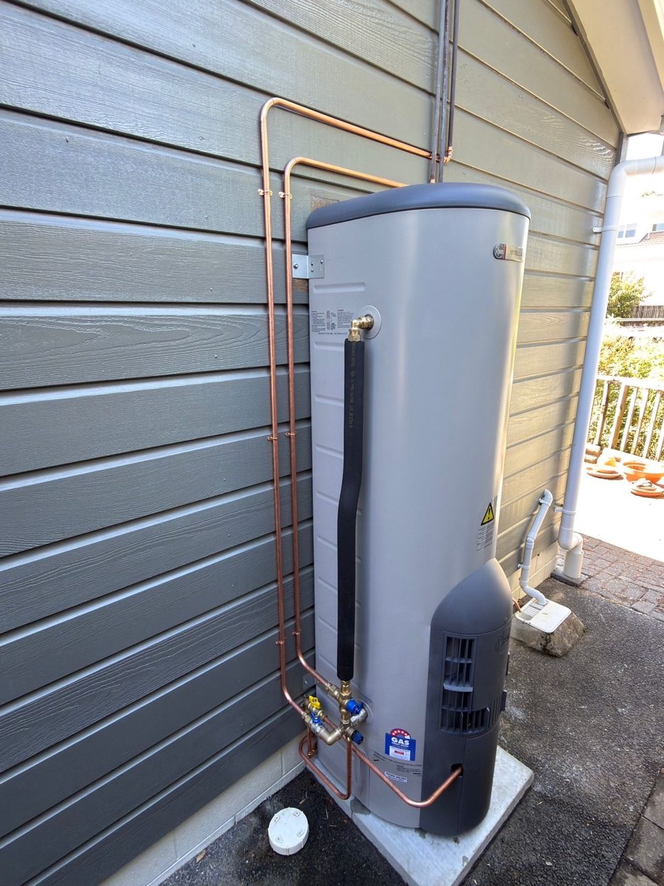 Rheem Stellar gas hot water cylinder professionally installed with copper pipework at Point Chevalier home
